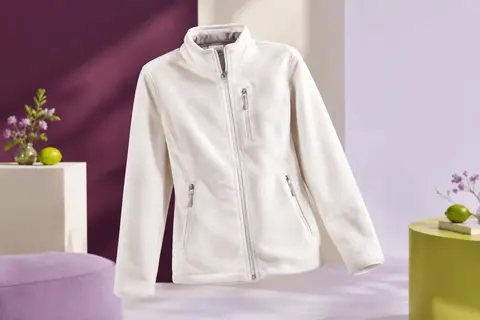 Veste polaire blanche pour femme en microfibre, avec fermeture centrale et poches extérieures zippées